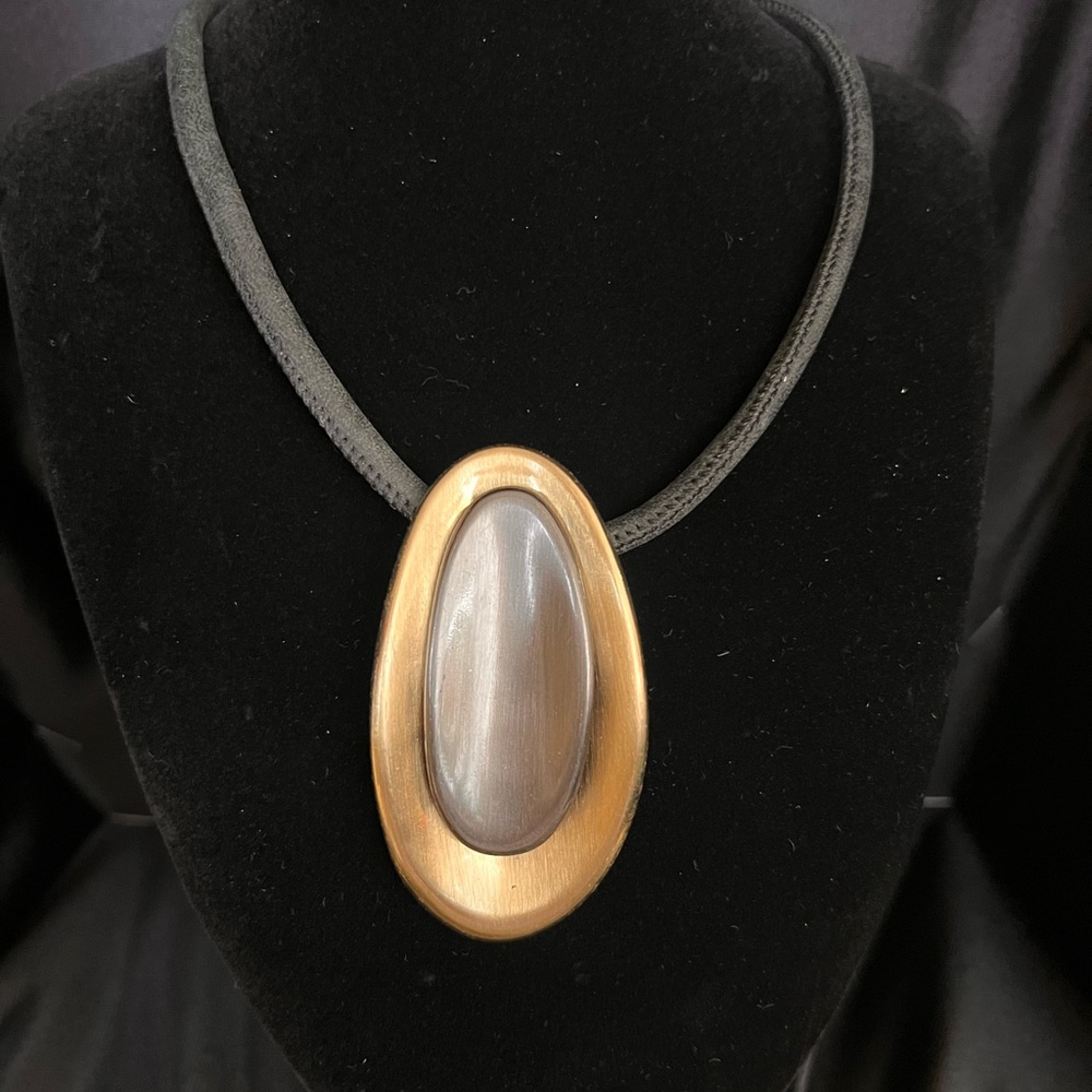 Elegant Gold and Silver Pendant Necklace